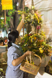 Offering flowers at the Chiang Mai Intakin Festival
