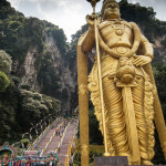 Lord Murugan towers over the entrance to Batu Caves, Malaysia